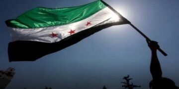 The Syrian flag… The revolution flag is the flag of independence.